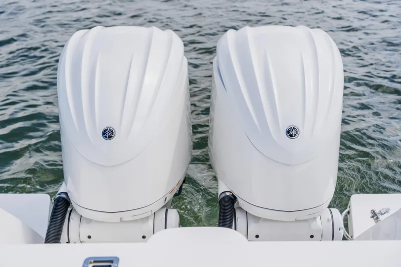 Slide: The Image of Twin Yamaha outboard engines on a 2018 Intrepid 327 Center Console boat. - 101