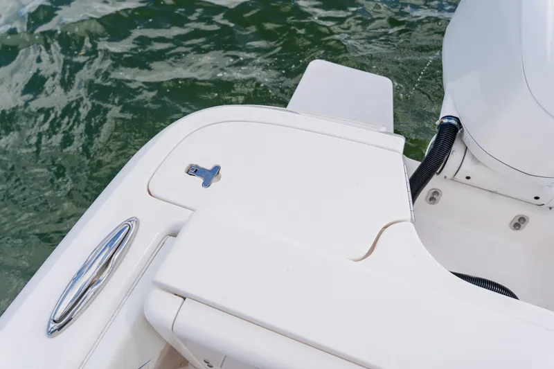 Slide: The Image of 2018 Intrepid 327 Center Console boat detail with water backdrop. - 103