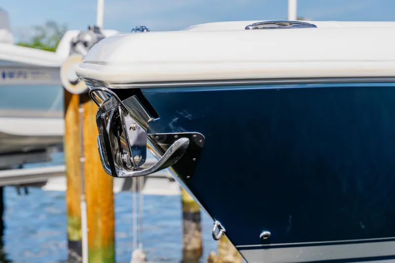 Slide: The Image of 2018 Intrepid 327 Center Console boat bow with chrome anchor detail. - 110