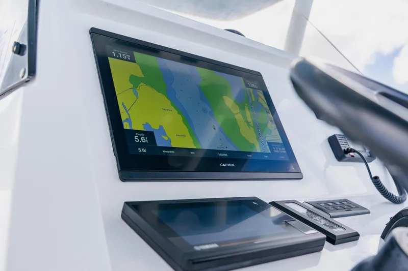 Slide: The Image of Garmin navigation display on 2018 Intrepid 327 Center Console boat dashboard. - 66