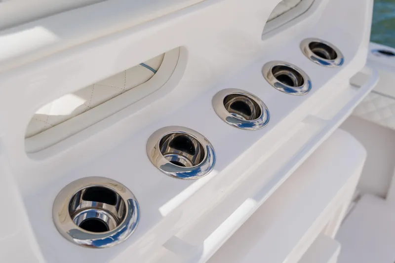 Slide: The Image of Stainless steel cup holders on 2018 Intrepid 327 Center Console boat. - 77