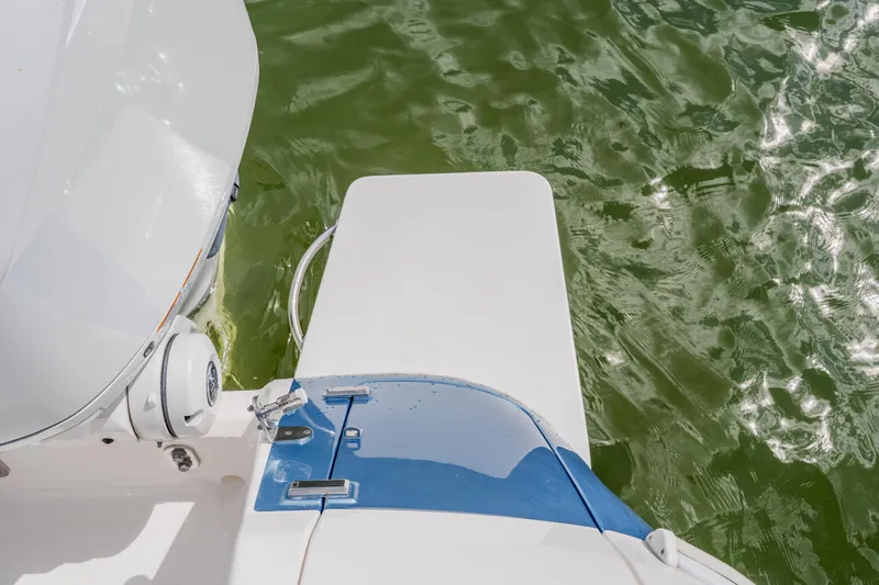 Slide: The Image of 2018 Intrepid 327 Center Console boat detail with water reflection. - 99