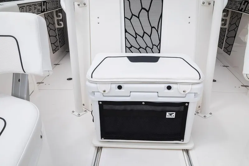 Slide: The Image of 2019 Wellcraft 262 Fisherman boat interior with white seating and storage. - 59