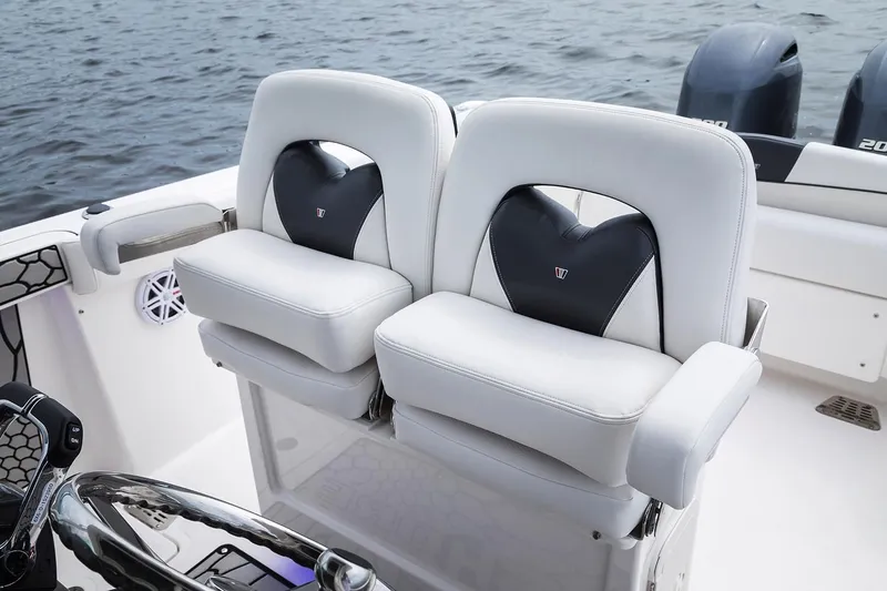 Slide: The Image of 2019 Wellcraft 262 Fisherman boat seats with dual outboard motors. - 61