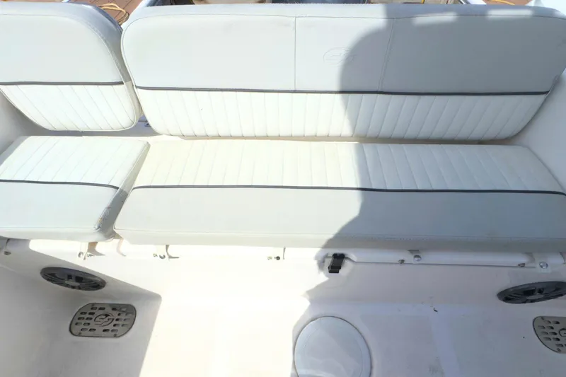 Slide: The Image of 2022 Sea Fox 248 Commander boat seating with white cushioned upholstery. - 11