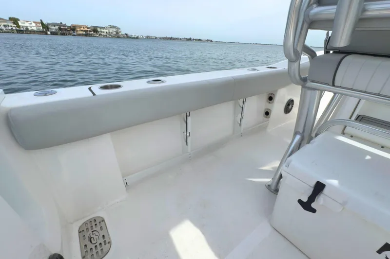 Slide: The Image of 2022 Sea Fox 248 Commander boat interior with seating and ocean view. - 16