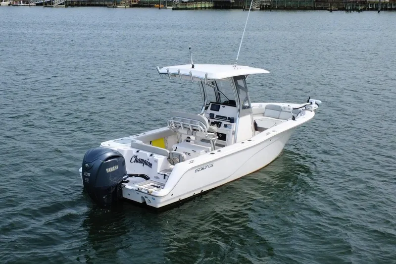 Slide: The Image of 2022 Sea Fox 248 Commander boat on water with Yamaha engine. - 2