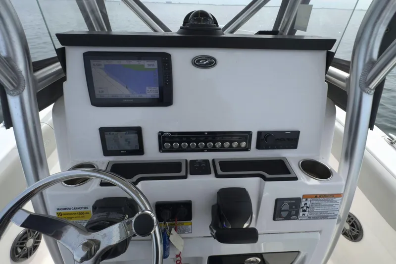 Slide: The Image of 2022 Sea Fox 248 Commander boat dashboard with navigation and control systems. - 21