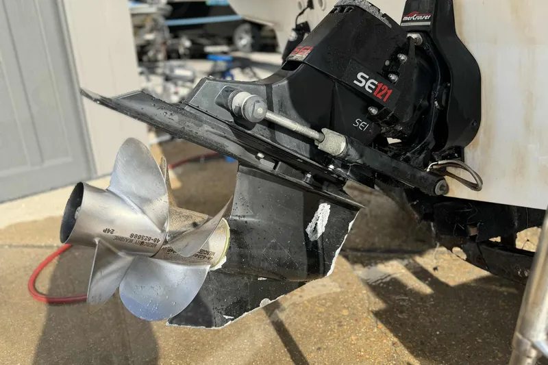 Slide: The Image of 1999 Bayliner 2655 Ciera boat propeller and outdrive close-up. - 3