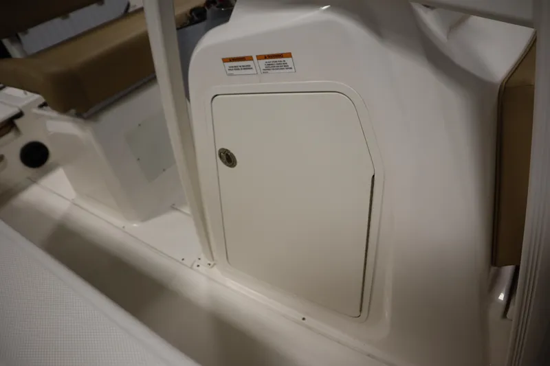 Slide: The Image of 2024 Bayliner Trophy T22CC boat interior storage compartment. - 21