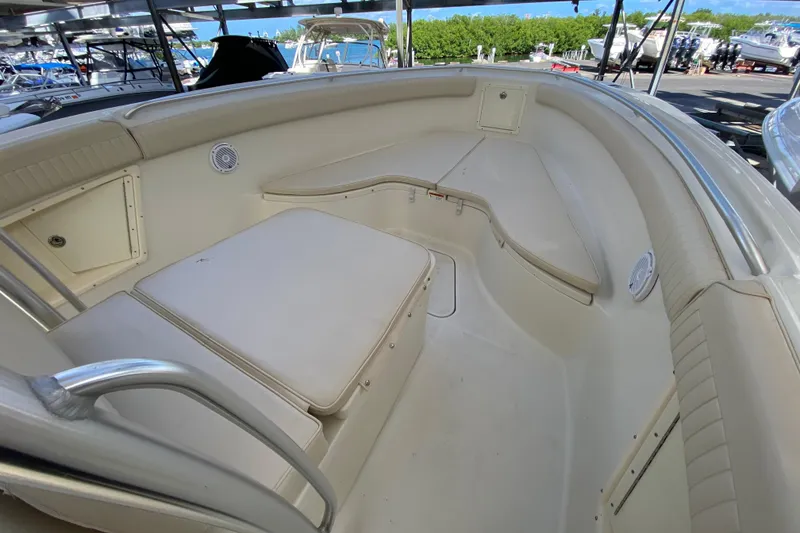 Slide: The Image of 2008 Hydra-Sports Vector 2900 CC boat interior with cushioned seating and storage compartments. - 15