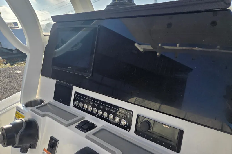 Slide: The Image of 2026 Sea Fox 248 Commander dashboard with modern navigation and control systems. - 8