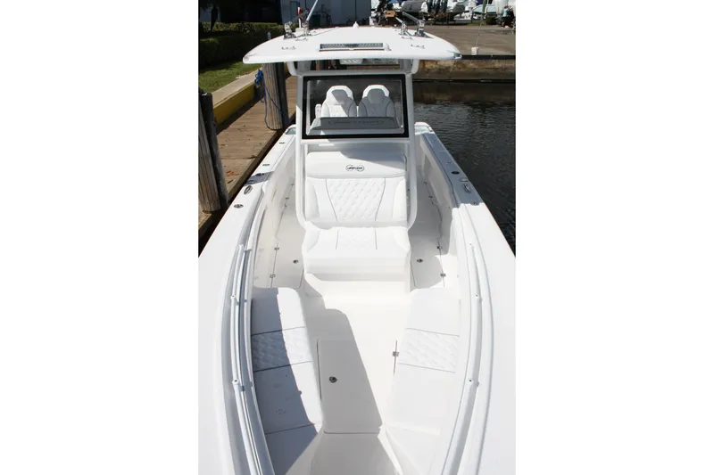 Slide: The Image of 2026 Limitless 270 boat with sleek white interior and modern design. - 11