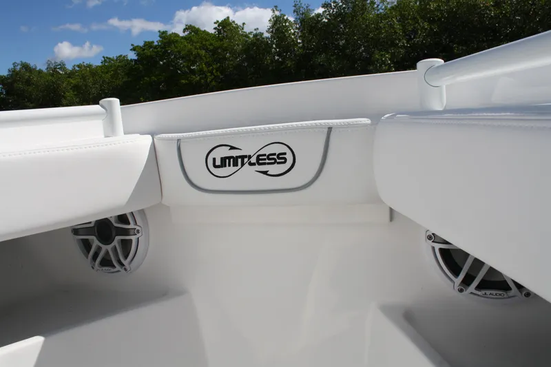 Slide: The Image of White Limitless 270 boat interior with speakers, showcasing sleek design and comfort, 2026 model. - 12