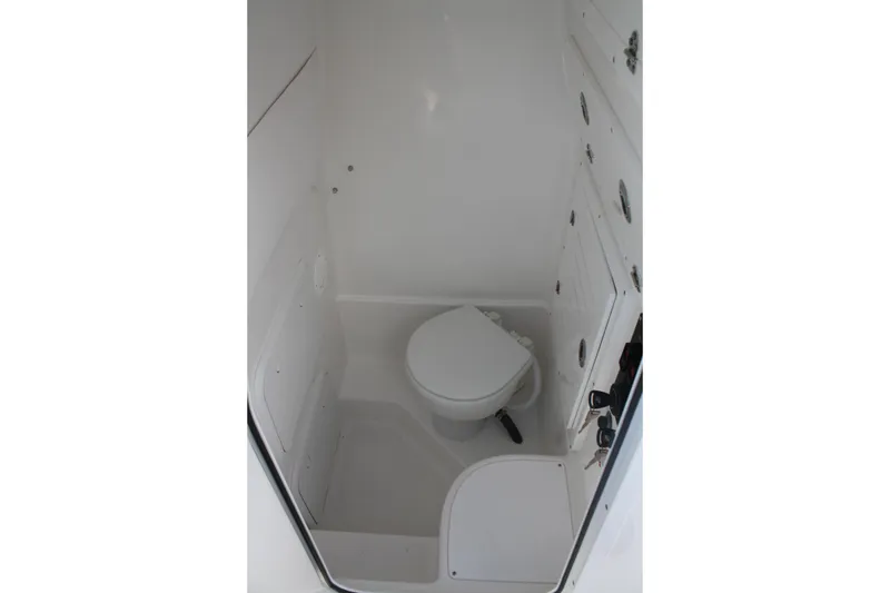 Slide: The Image of 2026 Limitless Center Console 270 Head Compartment with access Hatches and Electric Panel - 27