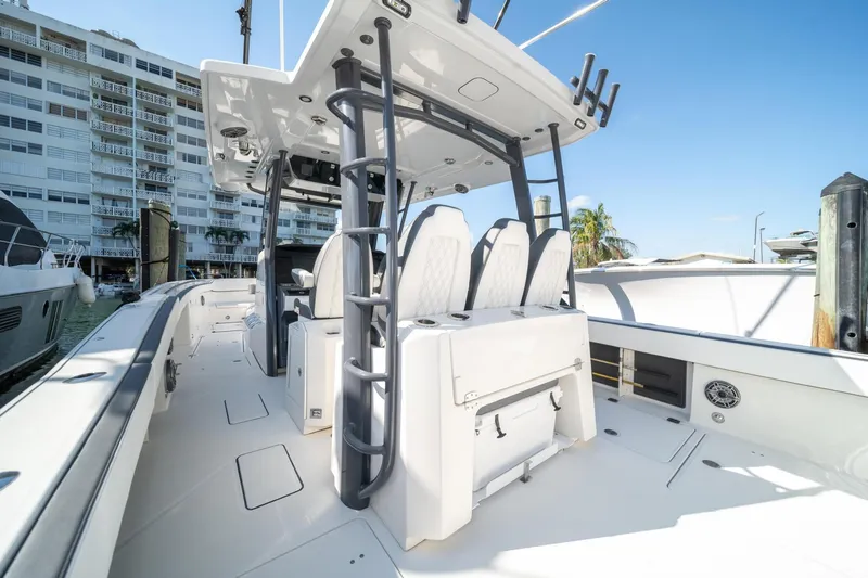 Slide: The Image of 2022 World Cat 400 CC-X boat interior with seating and helm station. - 28