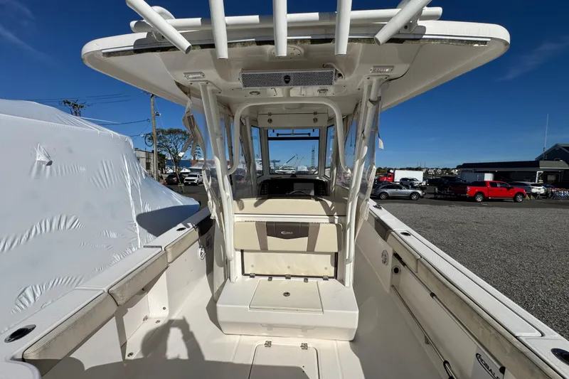Slide: The Image of 2019 Robalo R272 Center Console boat interior with seating and console view. - 4
