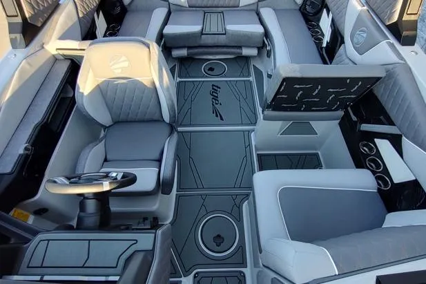 Slide: The Image of 2026 Tigé Z3 boat interior with modern seating and sleek design. - 5