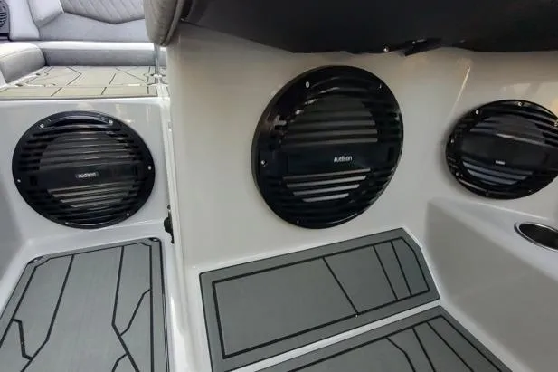 Slide: The Image of 2026 Tigé Z3 boat interior with custom audio speakers and sleek flooring design. - 9