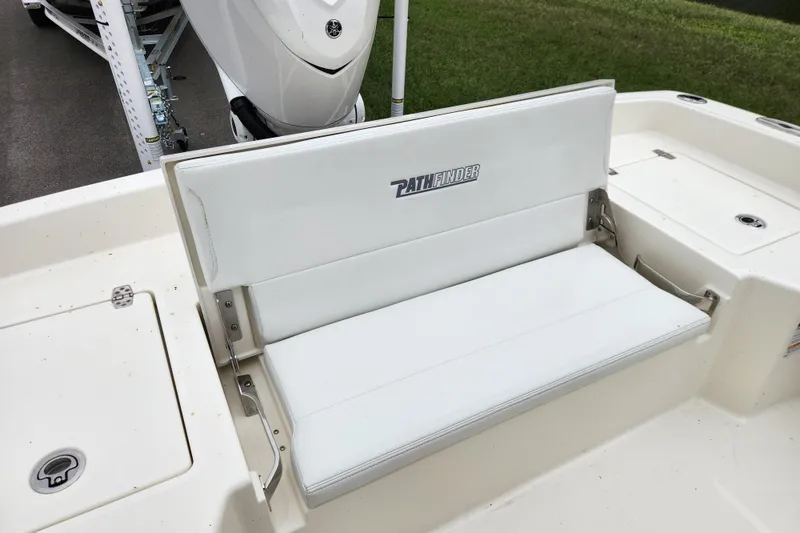 Slide: The Image of 2026 Pathfinder 2400 TRS boat seat with white upholstery and logo. - 15