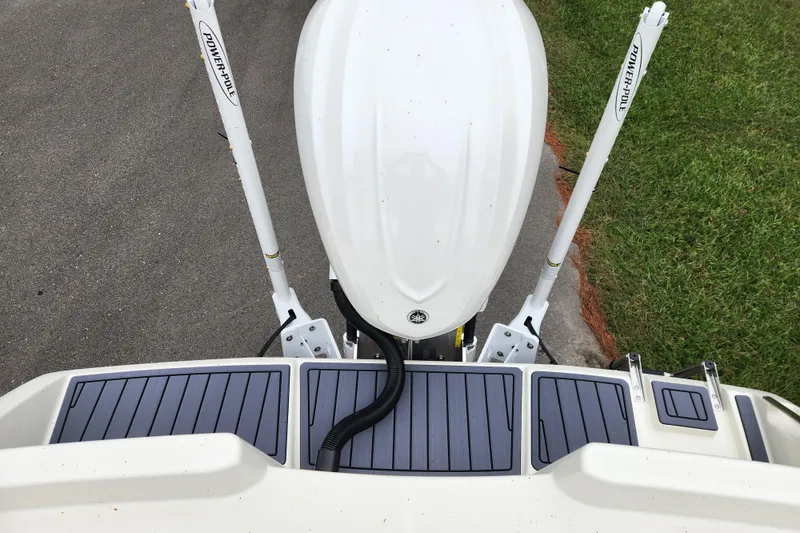 Slide: The Image of 2026 Pathfinder 2400 TRS boat with Power-Pole anchors, viewed from above. - 16