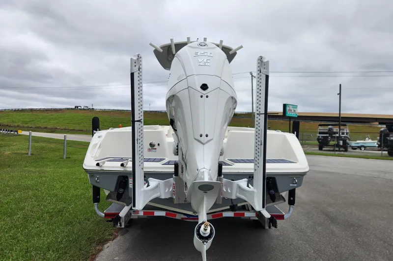 Slide: The Image of 2026 Pathfinder 2400 TRS boat with powerful outboard motor on trailer. - 3