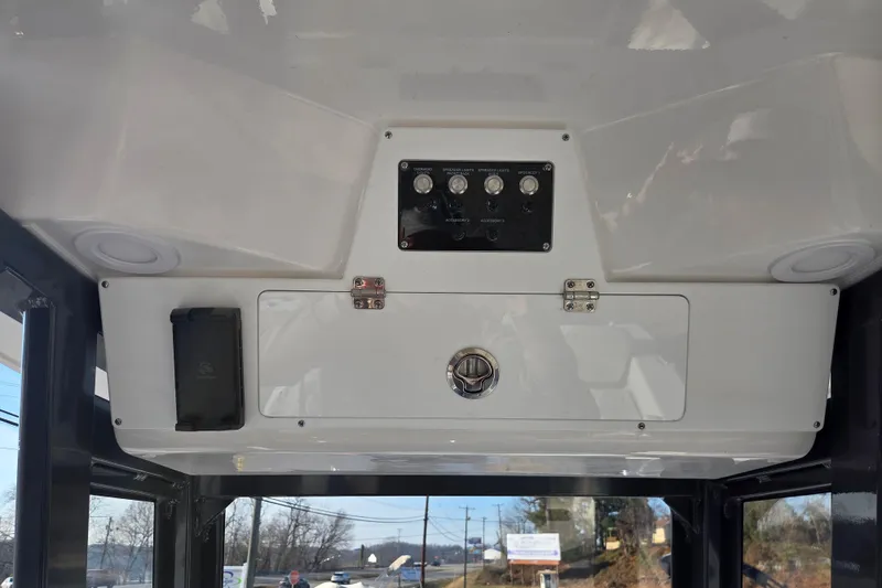 Slide: The Image of Interior view of 2026 Sea Fox 228 Commander boat console with control panel. - 16
