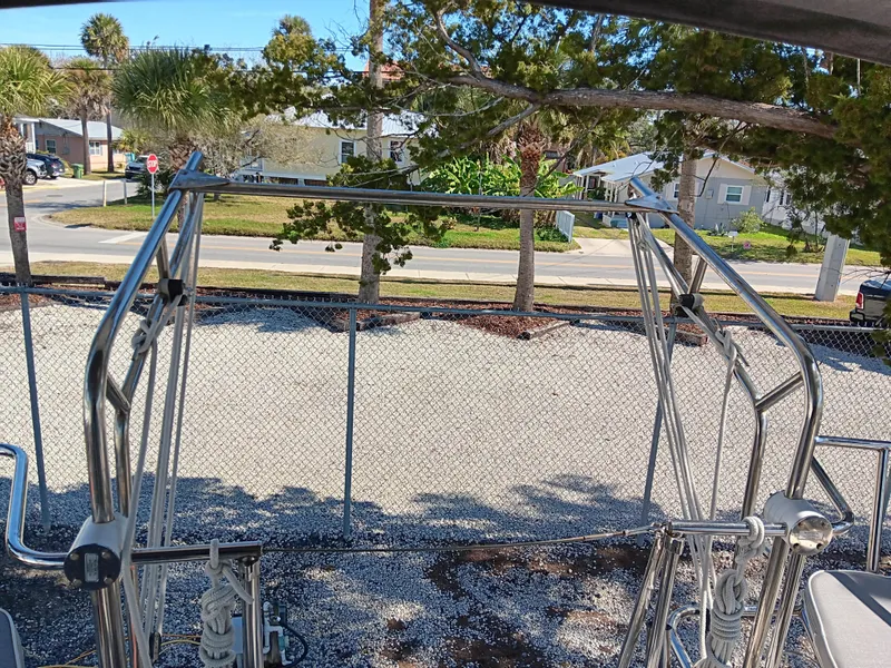 Slide: The Image of View from a 2020 Catalina 315 sailboat, showing the stern and surrounding area. - 11