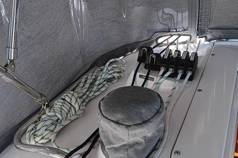 Slide: The Image of 2020 Catalina 315 sailboat deck with ropes and winch. - 15