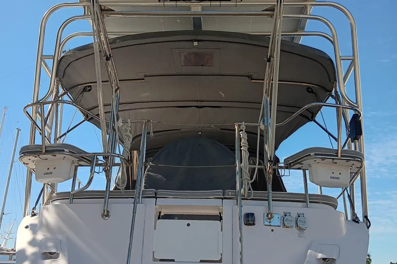 Slide: The Image of Rear view of a 2020 Catalina 315 sailboat with a covered cockpit. - 4