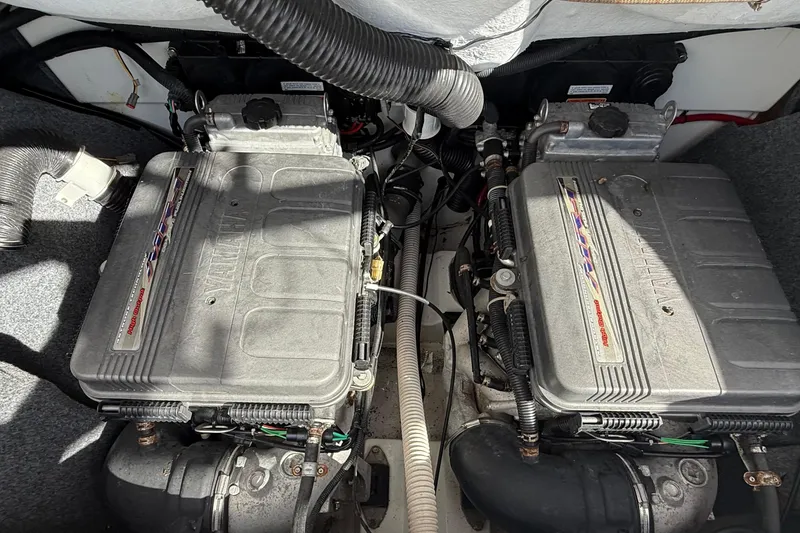 Slide: The Image of 2009 Yamaha Boats AR230 HO engine compartment with dual engines and visible components. - 4