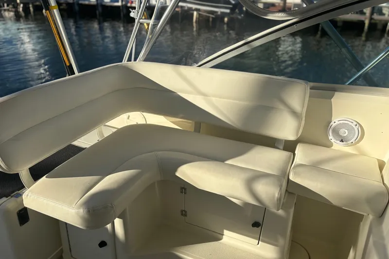Slide: The Image of Helm of 2000 Pursuit 3400 Express boat with controls and navigation equipment. - 18