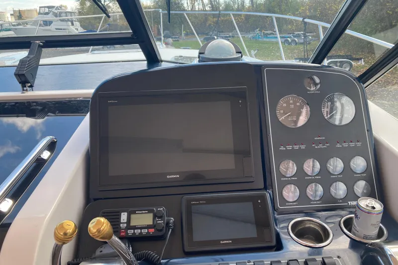 Slide: The Image of Control panel of a 1999 Tiara Yachts 3500 Open with Garmin navigation system. - 22