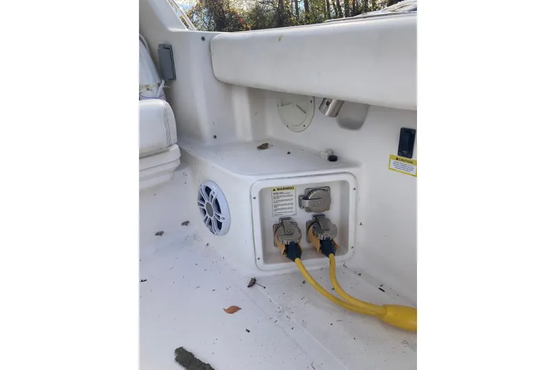 Slide: The Image of 1999 Tiara Yachts 3500 Open cockpit with electrical connections and speaker. - 31