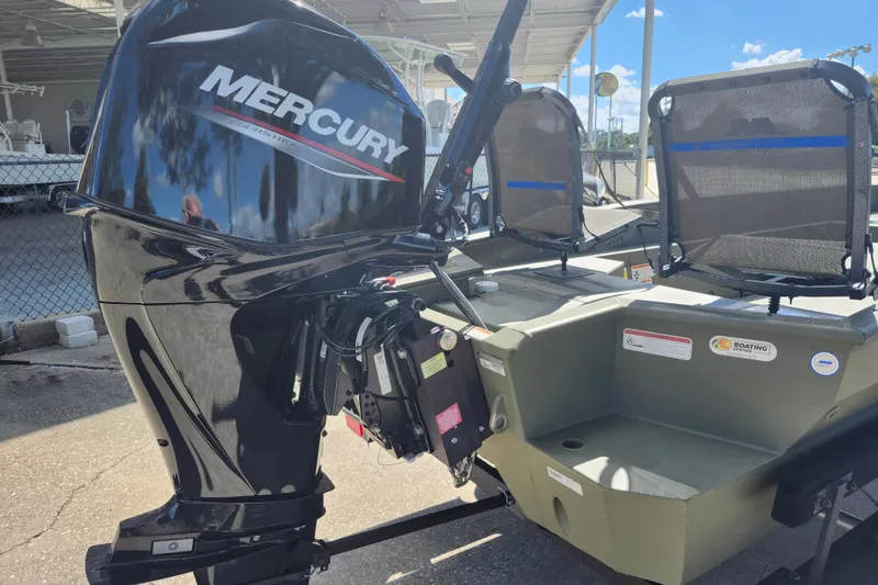 Slide: The Image of 2025 Tracker Grizzly 1650 T Prairie Wings Edition with Mercury outboard motor. - 4