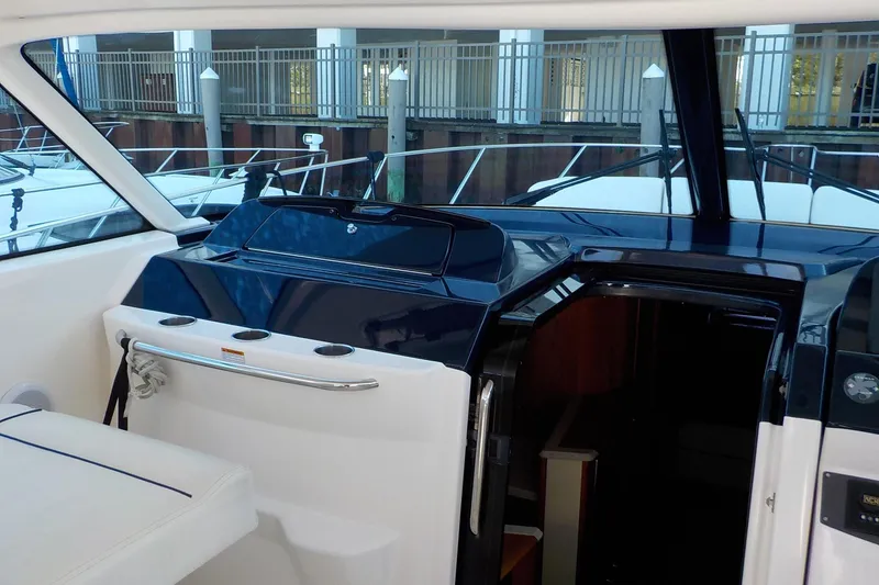 Slide: The Image of 2009 Tiara Yachts 3900 Open cockpit with sleek design and modern amenities. - 10