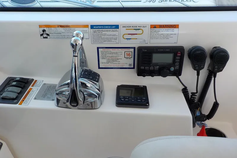 Slide: The Image of Control panel of a 2009 Tiara Yachts 3900 Open with navigation and communication equipment. - 11