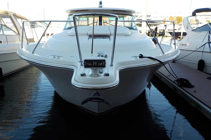 Slide: The Image of 2009 Tiara Yachts 3900 Open docked at marina, front view. - 2
