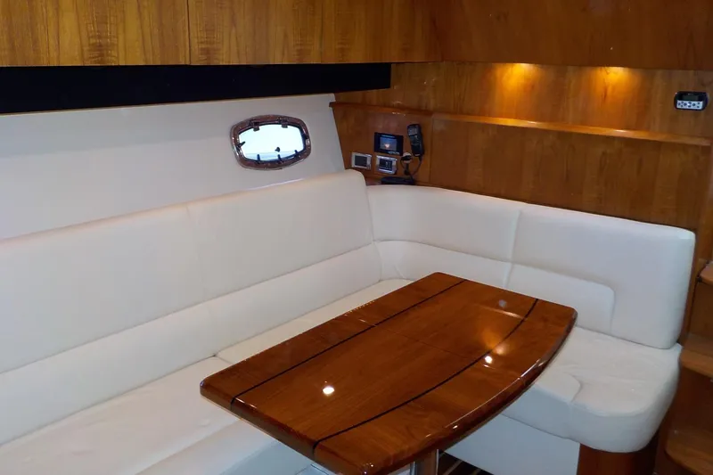 Slide: The Image of Luxurious interior of 2009 Tiara Yachts 3900 Open with elegant wood and leather seating. - 25