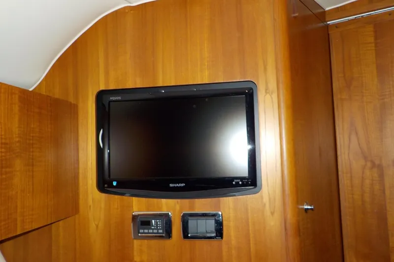 Slide: The Image of Wall-mounted Sharp TV in 2009 Tiara Yachts 3900 Open cabin interior. - 35