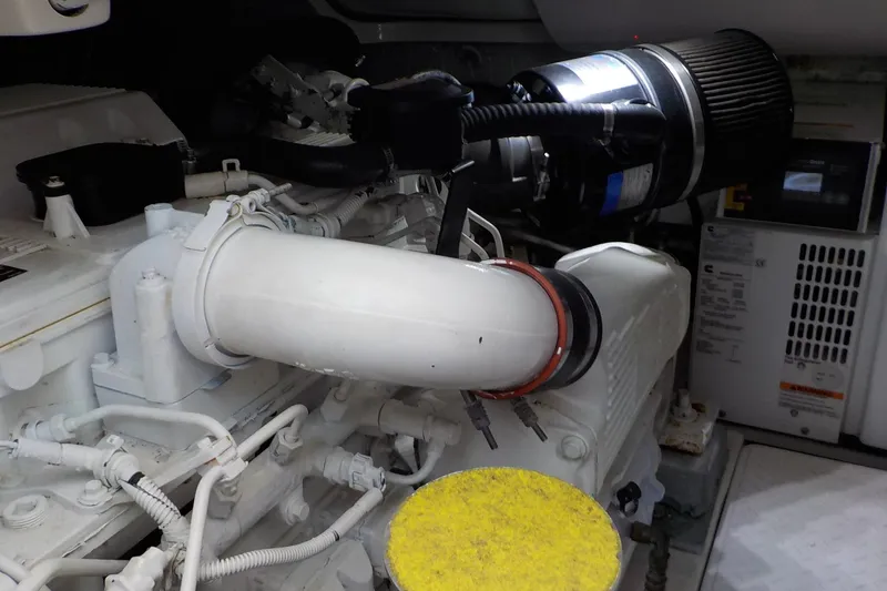 Slide: The Image of Engine compartment of a 2009 Tiara Yachts 3900 Open, showcasing mechanical components. - 38