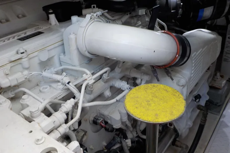 Slide: The Image of Engine compartment of a 2009 Tiara Yachts 3900 Open, showcasing mechanical components. - 40