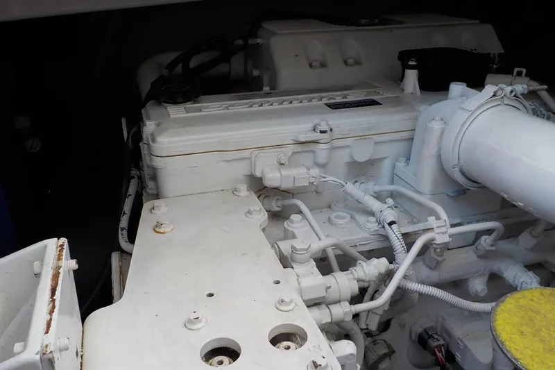 Slide: The Image of Engine compartment of 2009 Tiara Yachts 3900 Open, showcasing detailed mechanical components. - 41