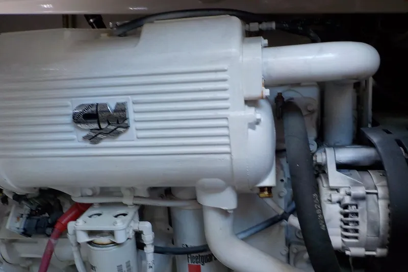 Slide: The Image of Engine compartment of a 2009 Tiara Yachts 3900 Open, showcasing mechanical components. - 43