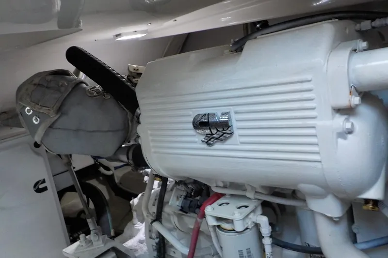 Slide: The Image of Engine compartment of a 2009 Tiara Yachts 3900 Open, showcasing detailed machinery. - 46