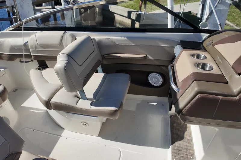 Slide: The Image of 2014 Formula 240 Bowrider interior with seating and cup holders. - 32