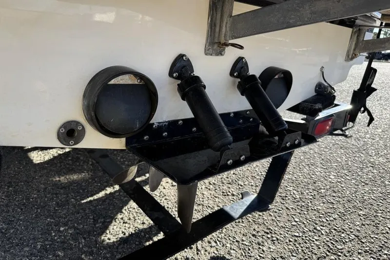 Slide: The Image of 1999 Tigé 2100V Limited boat trailer hitch and exhaust detail. - 14