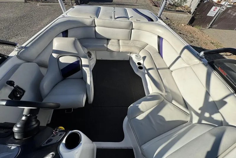 Slide: The Image of 1999 Tigé 2100V Limited boat interior with spacious seating and modern design. - 23