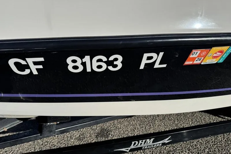 Slide: The Image of 1999 Tigé 2100V Limited boat with registration CF 8163 PL on DHM trailer. - 69