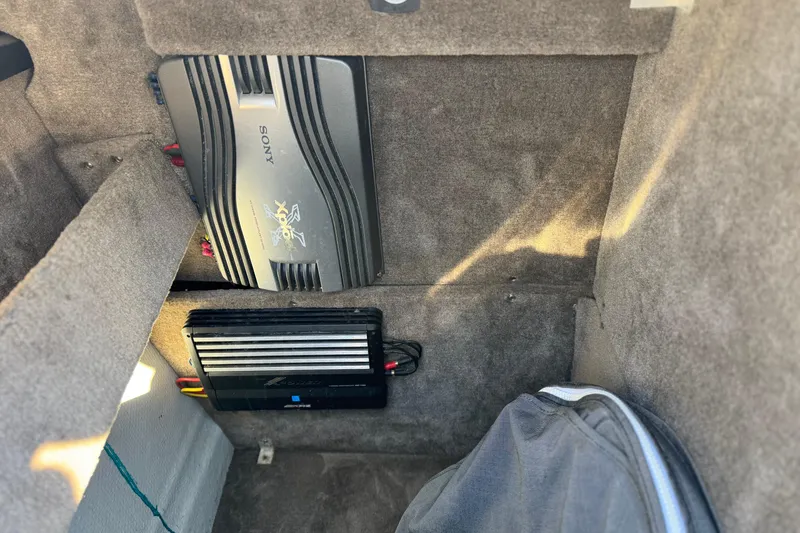Slide: The Image of Audio equipment installed in a 2007 Cobalt 252 boat interior. - 17